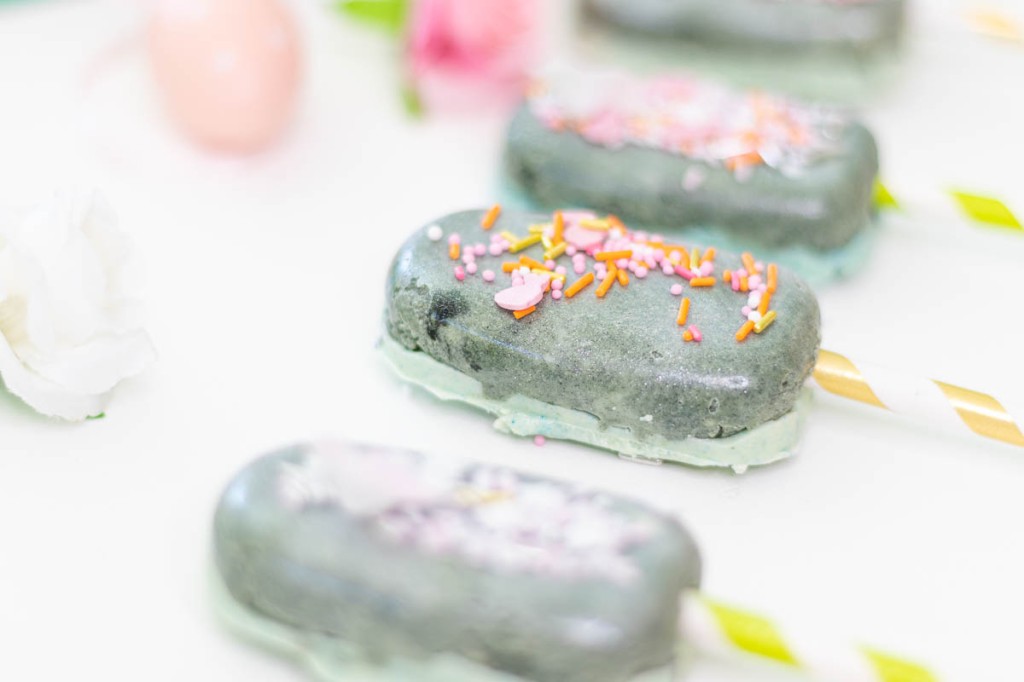 teal cakesicles with Easter sprinkles